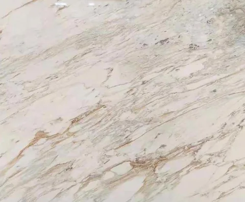 cream-beige stone slab, with fine veining, in a close surface view