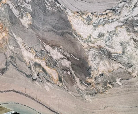 gray stone slab, with bold veining, in a close surface view