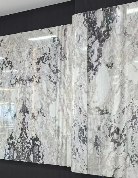 white stone slab, with bold veining and a reflective finish, against a dark background