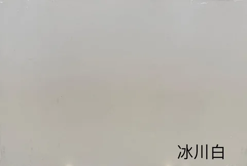 gray engineered stone slab, with a single full slab and a plain surface, in a close surface view