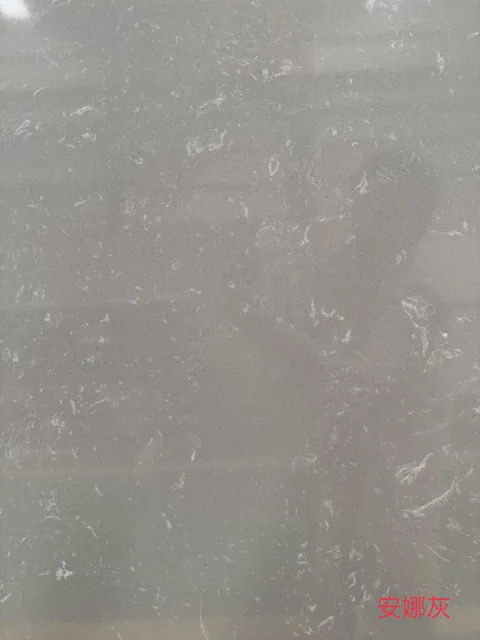 gray engineered stone slab, with closely spaced markings and an uncluttered setting