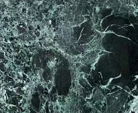 green stone slab, with a single full slab and bold veining, in a close surface view