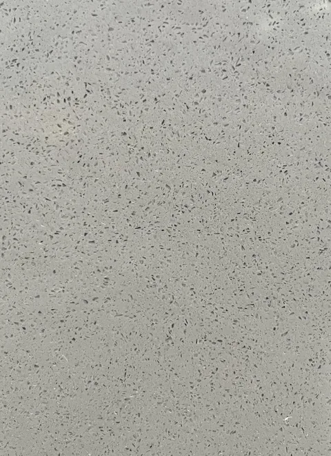 gray engineered stone slab, with speckled texture, shown from an overhead view