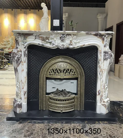 White Volakas marble fireplace surround, with carved scrollwork and bold veining, in a showroom