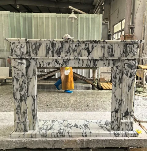 White Volakas marble fireplace surround, shown from a frontal view with broad sweeping markings