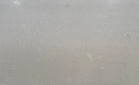 gray engineered stone slab, shown from an overhead view with subtle pattern contrast