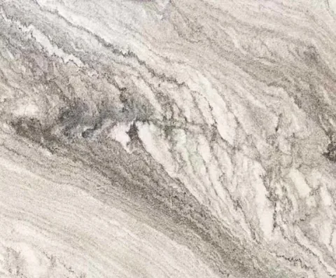 white stone slab, with bold veining, in a close surface view
