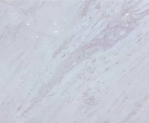 white stone slab, with fine veining, showing a single main form