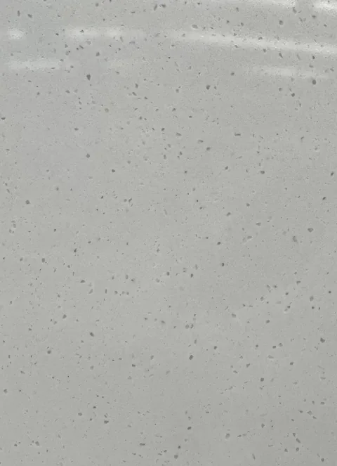 gray engineered stone slab, with speckled texture and uncluttered setting