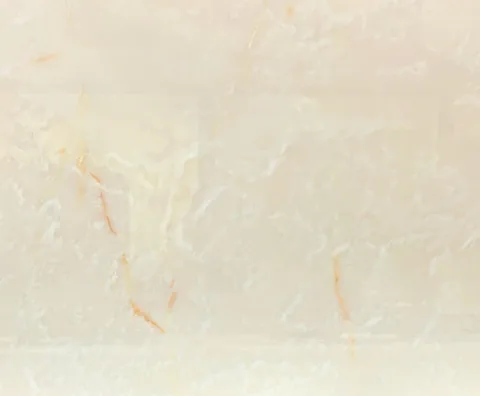 cream-beige stone slab, with a single full slab and cloudy mottling, in a close surface view