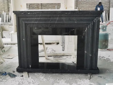 White Volakas marble fireplace surround, with fine veining, showing a single main form