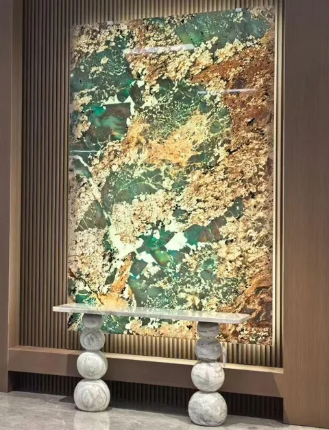 green stone slab, with a single full slab and angular breccia fragments, in a showroom