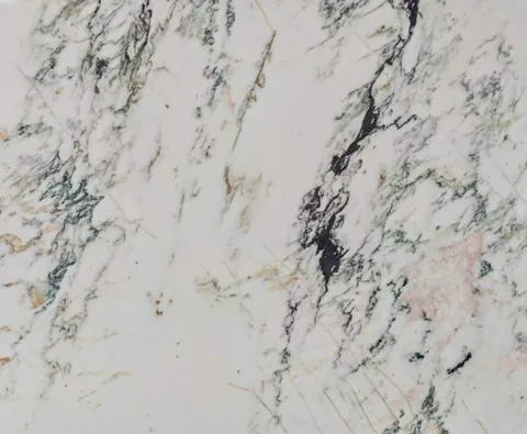 white stone slab, with bold veining, in a close surface view