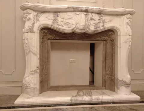 White Volakas marble fireplace surround, with fine veining, showing a single main form with an uncluttered setting
