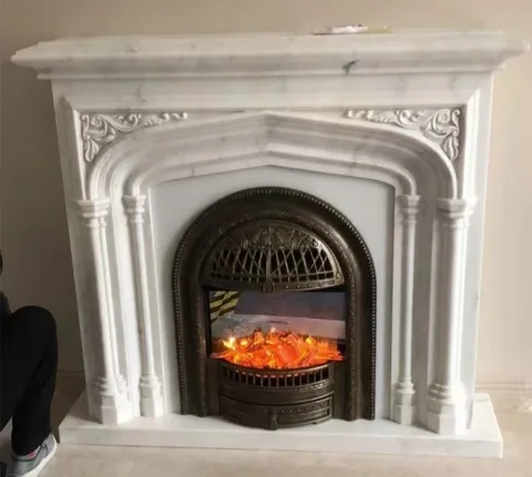 White Volakas marble fireplace surround, with an arched opening and fine veining, in a furnished room
