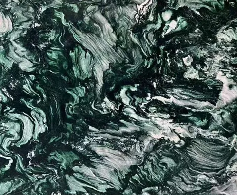 green stone slab, with a single full slab and cloudy mottling, in a close surface view