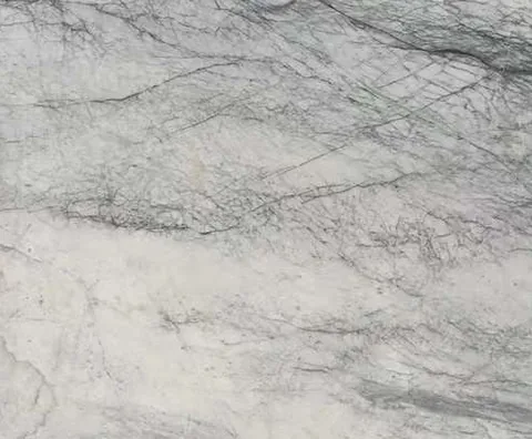 white stone slab, with fine veining, shown from an overhead view with an uncluttered setting