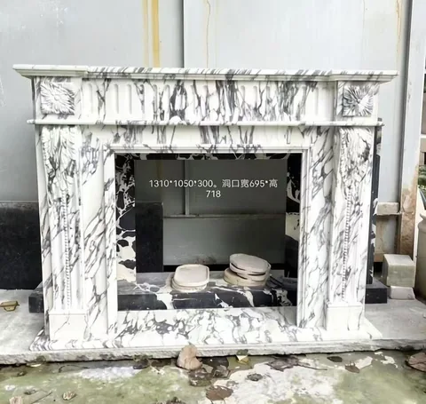 White Volakas marble fireplace surround, showing a single main form