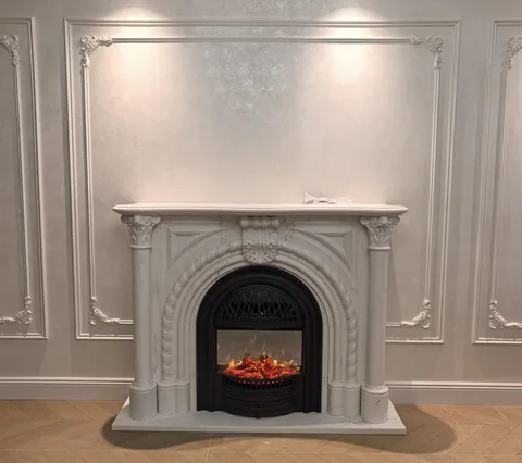 White Volakas marble fireplace surround, with subtle pattern contrast