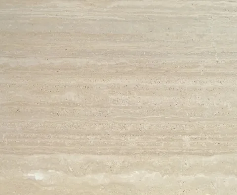 cream-beige stone slab, with linear travertine grain, in a close surface view