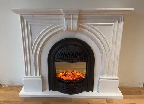 White Volakas marble fireplace surround, shown from a frontal view