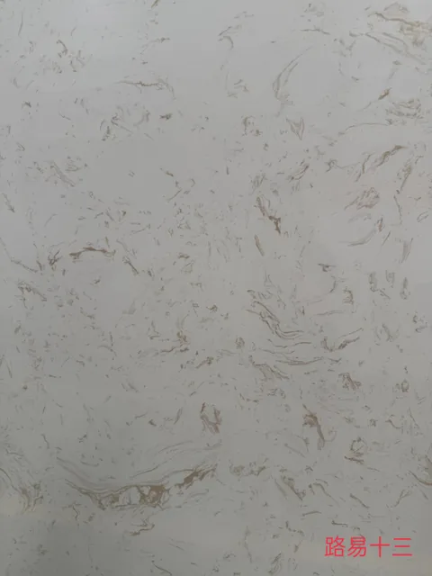 cream-beige engineered stone slab, with a single full slab and fine veining, in a close surface view