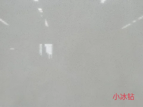 gray engineered stone slab, with speckled texture, showing a single main form with subtle pattern contrast