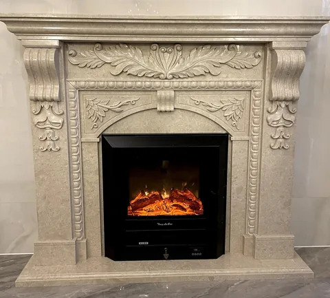 White Volakas marble fireplace surround, with cloudy mottling and a reflective finish, in a showroom