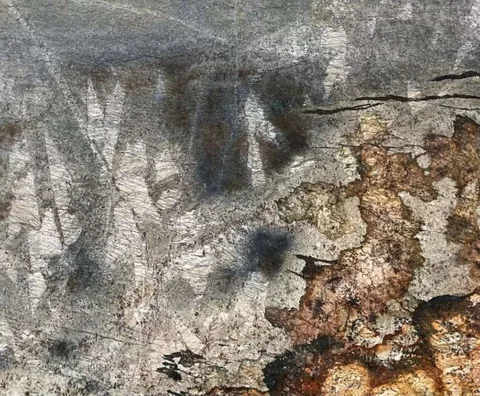 gray stone slab, with a single full slab and cloudy mottling, in a close surface view