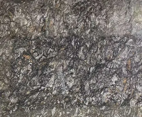 gray stone slab, with a single full slab and cloudy mottling, in a close surface view