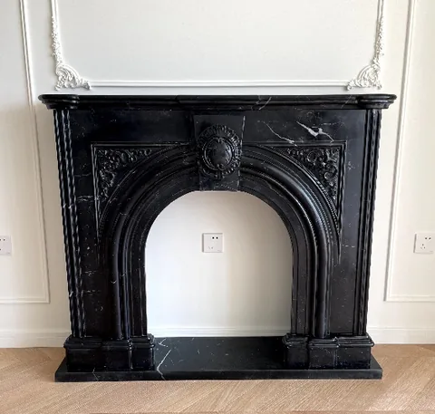 White Volakas marble fireplace surround, with fine veining and closely spaced markings