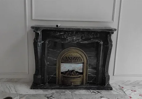 White Volakas marble fireplace surround, with fine veining, showing a single main form with strong pattern contrast