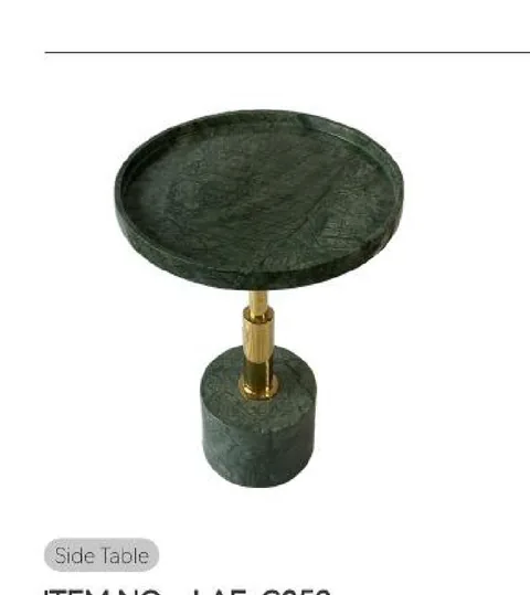 green stone side table, with a round top and cloudy mottling, on a plain backdrop