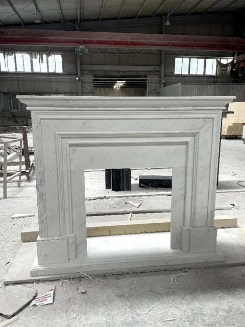 White Volakas marble fireplace surround, with closely spaced markings