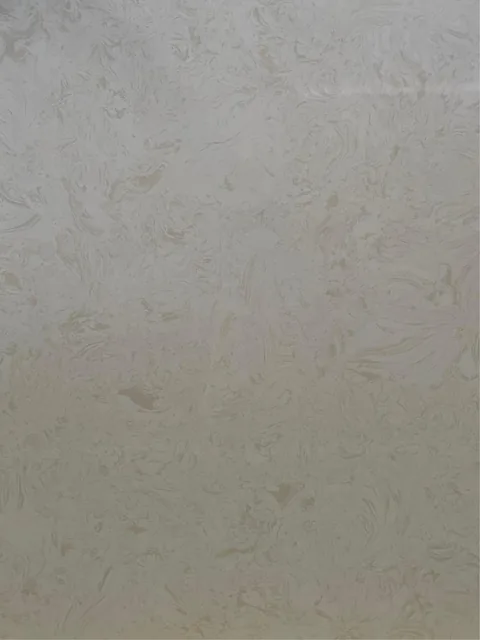 gray engineered stone slab, with cloudy mottling, showing a single main form with subtle pattern contrast
