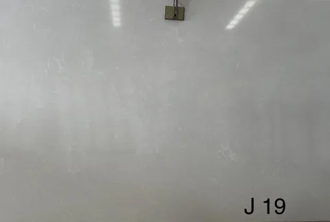gray engineered stone slab, with cloudy mottling, showing a single main form with subtle pattern contrast
