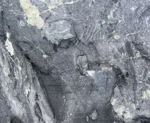 gray stone slab, with fine veining, in a close surface view