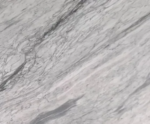white stone slab, with fine veining, shown from an overhead view with single main form