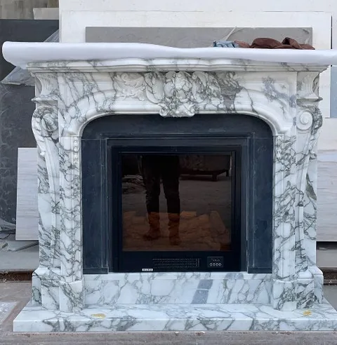 White Volakas marble fireplace surround, with bold veining, shown from a frontal view with single main form