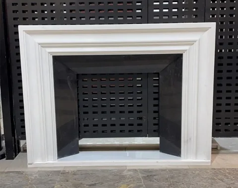 travertine fireplace surround, with stepped tiers and a plain surface, in a showroom
