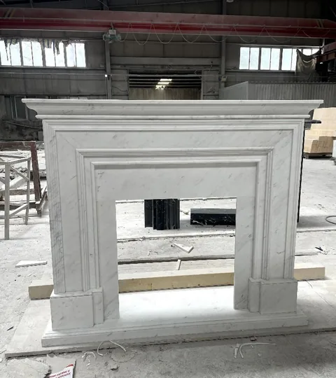 White Volakas marble fireplace surround, with fine veining, shown from a frontal view