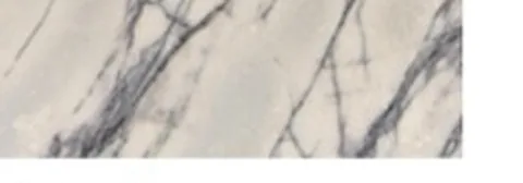 white stone slab, with fine veining, in a close surface view