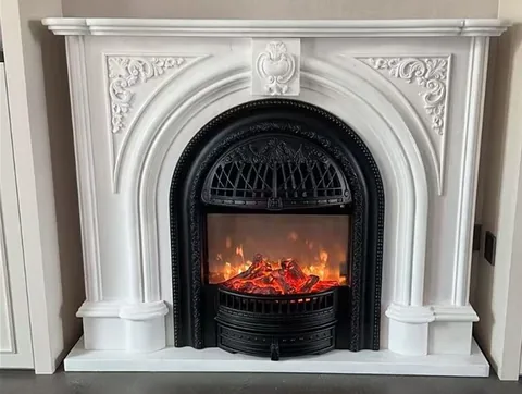 White Volakas marble fireplace surround, shown from a frontal view with single main form