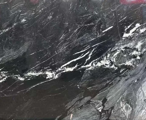black stone slab, with broad sweeping markings