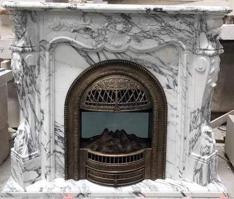 White Volakas marble fireplace surround, with fine veining, shown from a frontal view with single main form