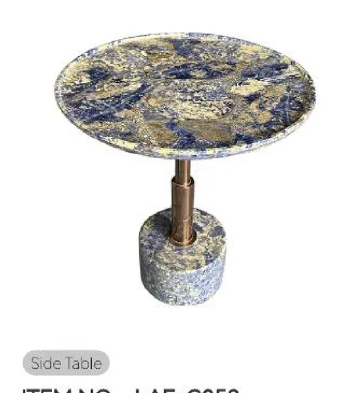 multicolored stone side table, with a round top and cloudy mottling, on a plain backdrop
