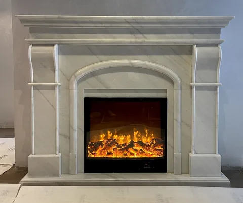 Arabescato Corchia marble fireplace surround, with an arched opening and fine veining, against a pale background