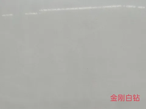 gray engineered stone slab, with a single full slab and a plain surface, in a close surface view