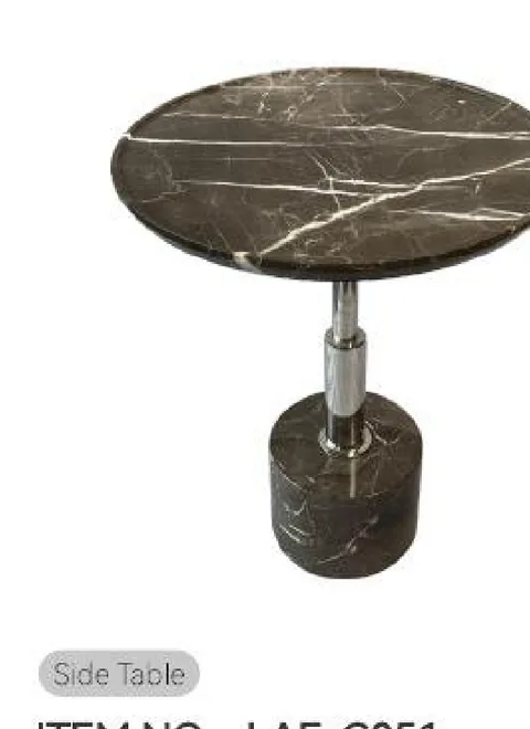 brown stone side table, with bold veining and a reflective finish, on a plain backdrop