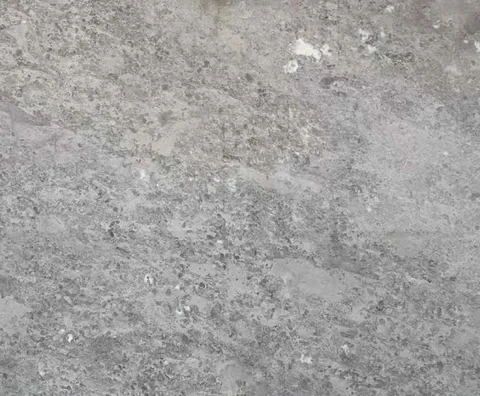gray stone slab, with closely spaced markings